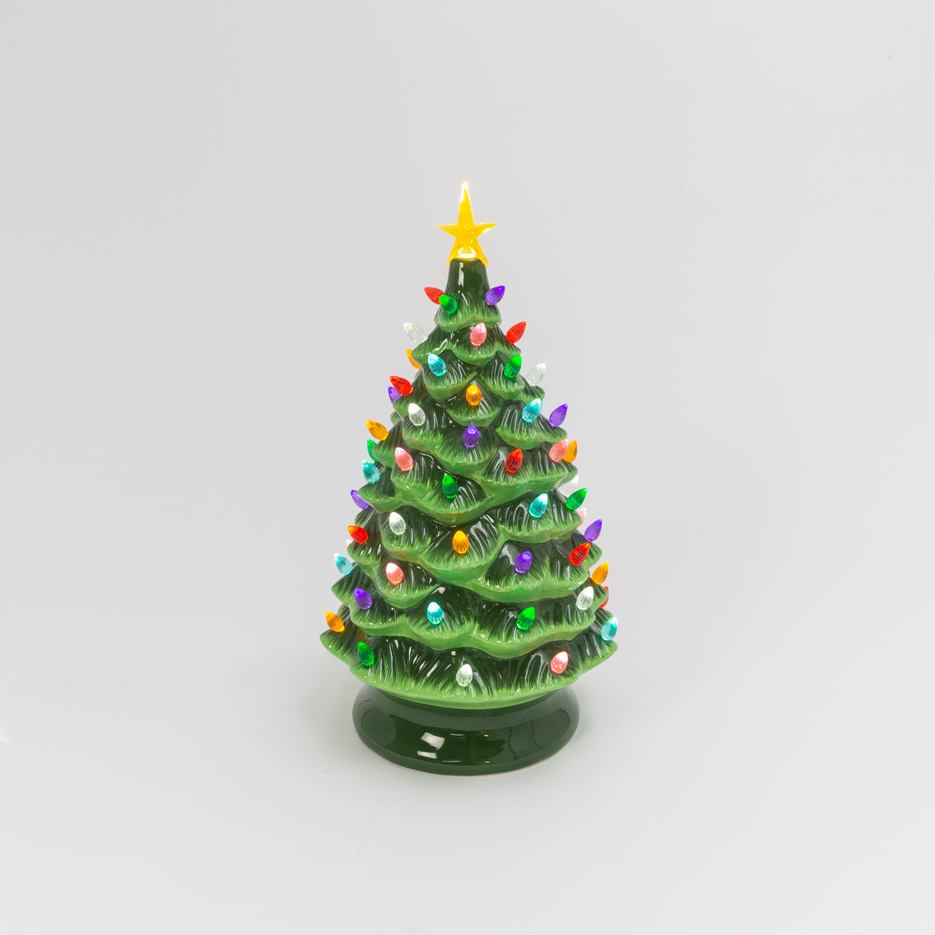 Illuminated 24 in H Battery Operated Lighted Musical Ceramic Christmas Tree
